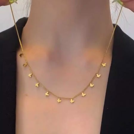 Picture of "Mariposas" Collar de acero titanio dorado mujer